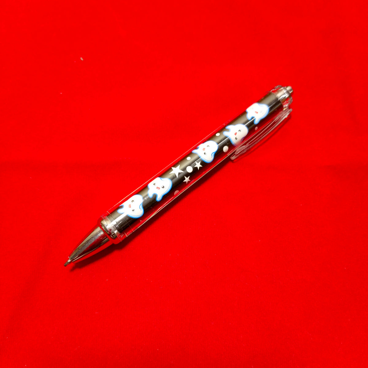 Ballpoint Pen, teeth printed on black theme