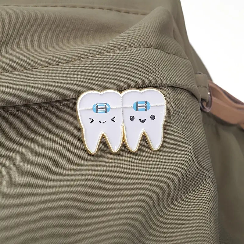 Lapel pins of tooth with braces
