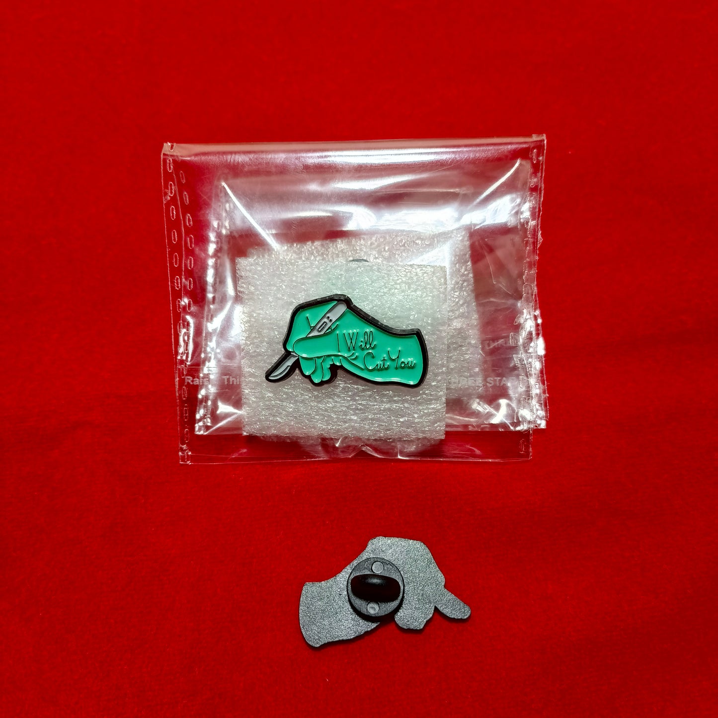 Lapel pins brooch of scalpel in hand